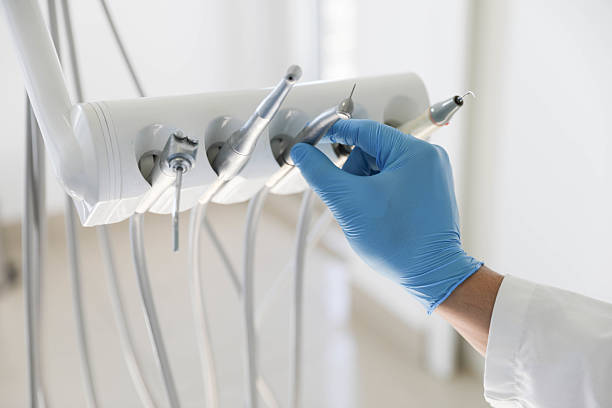 Professional Tooth Extraction technician working in Nashville, MI